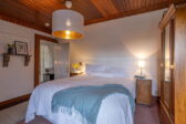 Mendocino Places to Stay - Dennen Suite bed